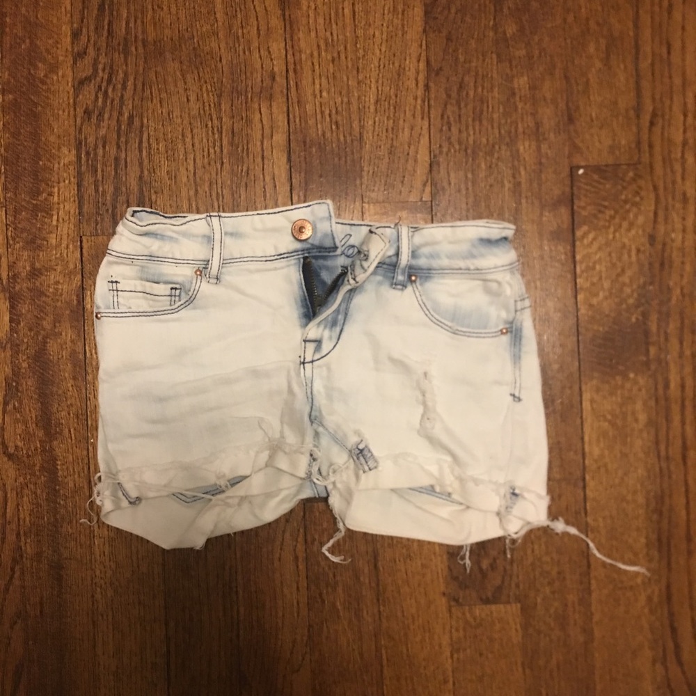 Bleached white distressed ripped shorts